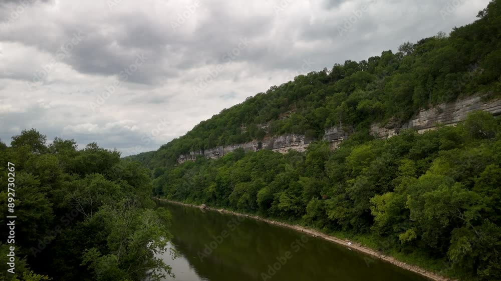 Flying along a gorge on the Kentucky River near the city of Harrodsburg on a bright, overcast day. Flying along a gorge on the Kentucky River near the city of Harrodsburg on a bright, overcast day.