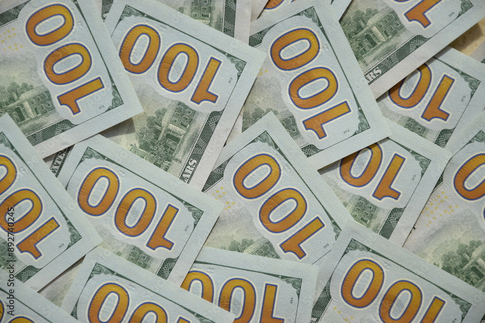 Processed collage of many US hundred dollar bills banknotes texture. Background for banner Processed collage of many US hundred dollar bills banknotes texture. Background for banner
