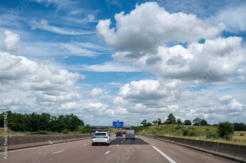 Driving in summer on road, road signs direction to Lille, Nancy and other French cities, different types or roads in France, transportation and traffic photo