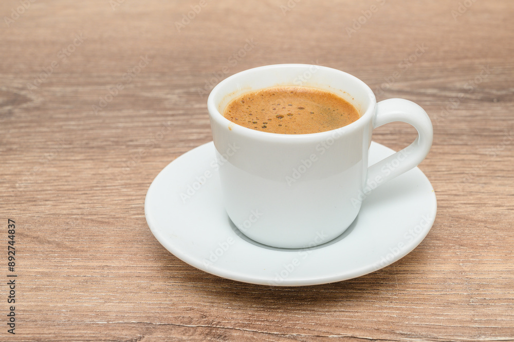 Turkish cup of coffee on the wooden table Turkish cup of coffee on the wooden table