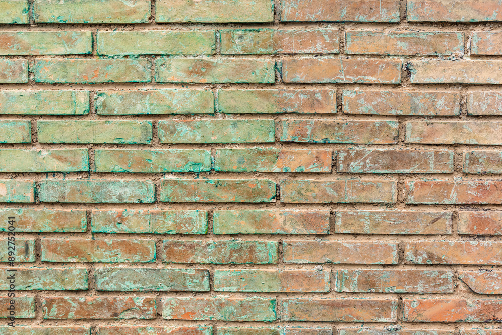 Detalle de una vieja pared hecha con ladrillos con restos de pintura, fondo textura Detalle de una vieja pared hecha con ladrillos con restos de pintura, fondo textura