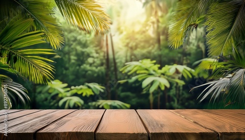 Jungle table background. Rustic wooden table against the backdrop of tropical plants, palms and jungle. © Louis