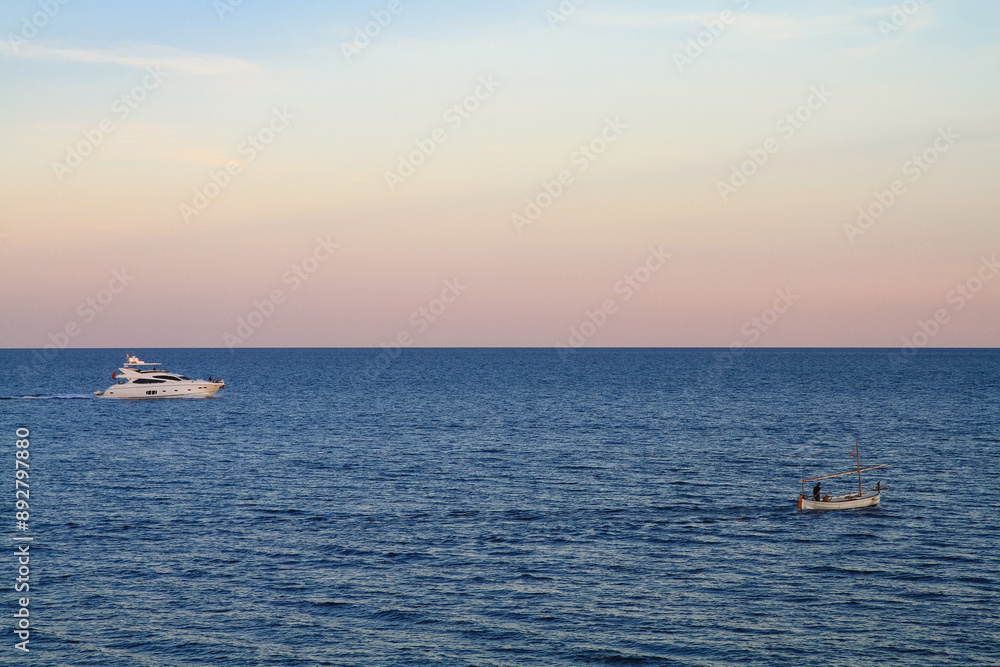 Naklejka premium a beautiful ship is sailing in the blue sea