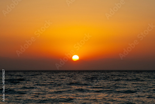 beautiful dramatic landscape of sunset on the sea beach