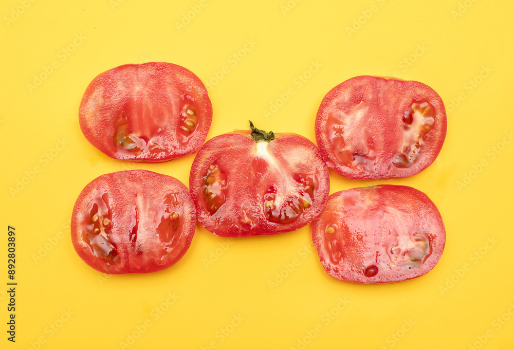 Fototapeta premium Slices of a fresh tomato