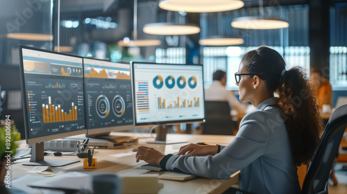 a girl corporate attire depicting business statistics and graphics with a futuristic concept, woman works on computer, backround digital hologram