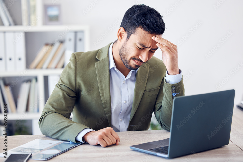 Businessman, stress and headache with laptop in office for budget report, anxiety and brain fog. Frustrated, financial planner and confused with crisis at desk for investment error, debt and solution Businessman, stress and headache with laptop in office for budget report, anxiety and brain fog. Frustrated, financial planner and confused with crisis at desk for investment error, debt and solution