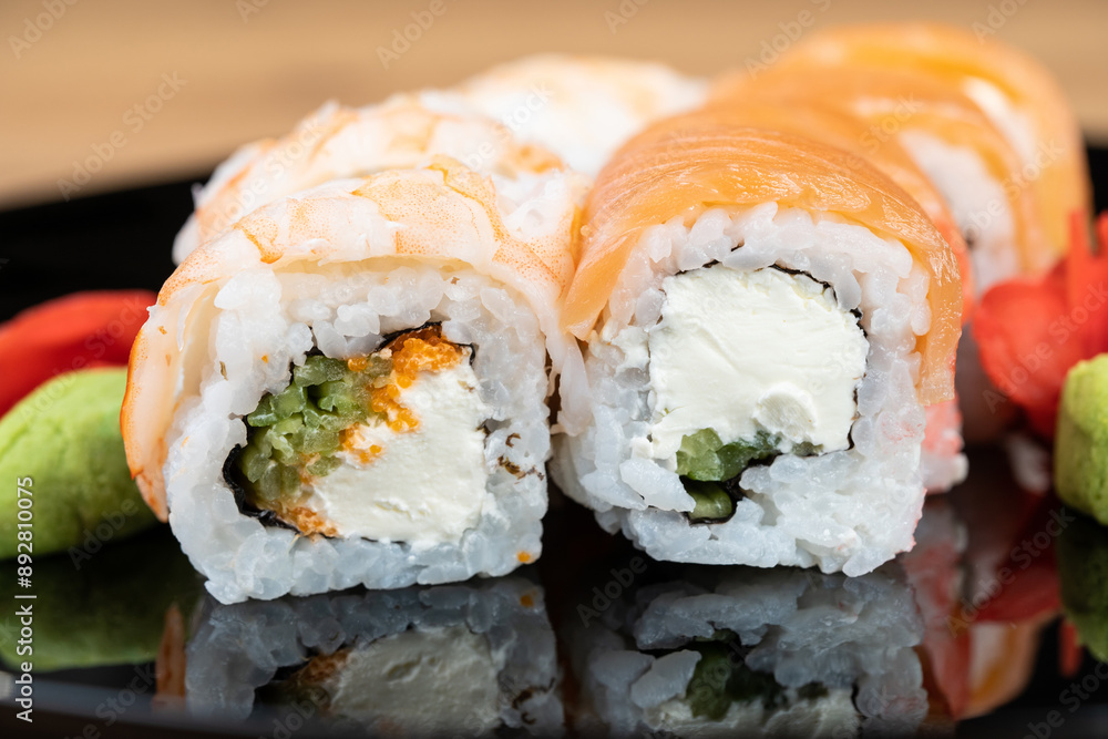 delicious traditional Japanese sushi and rolls on a plate delicious traditional Japanese sushi and rolls on a plate