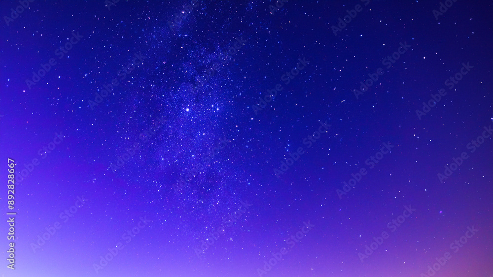 A blue-purple night sky with shining stars A blue-purple night sky with shining stars