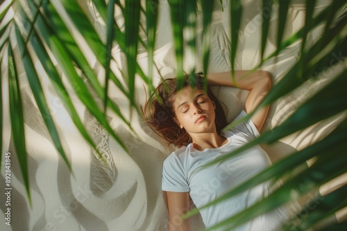 Young girl lies her side experiencing serene moment of rest. Serene slumber captured teen girl enjoys her nap snug bed. Purity and innocence of youth portrayed peaceful sleep.