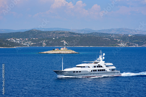 Luxury yacht near Murvica lighthouse. Approaches to Split, Croatia