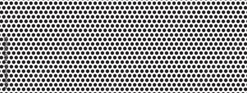 Black circular dots on white background. Mosaic holey print. Perforated metal texture. Peg board, radiator or speaker grill surface with repeated round holes. Vector graphic illustration