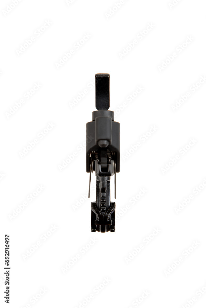 Shock trigger for gun isolate on white back. Gun trigger. Repair spare part.