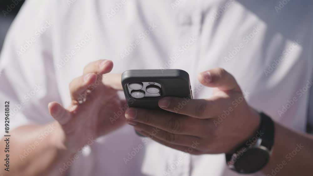 Business men hands typing message on smartphone slow motion Business men hands typing message on smartphone slow motion