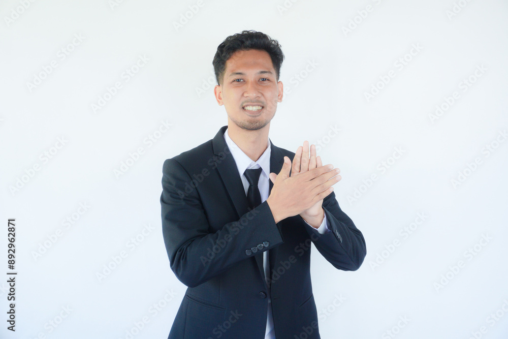 Asian manager wearing black suit give applause during interview process Asian manager wearing black suit give applause during interview process