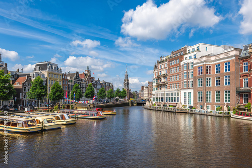 Canvas Print The Munttoren or Munt, is the Mint Tower located on  Muntplein square in Amsterd