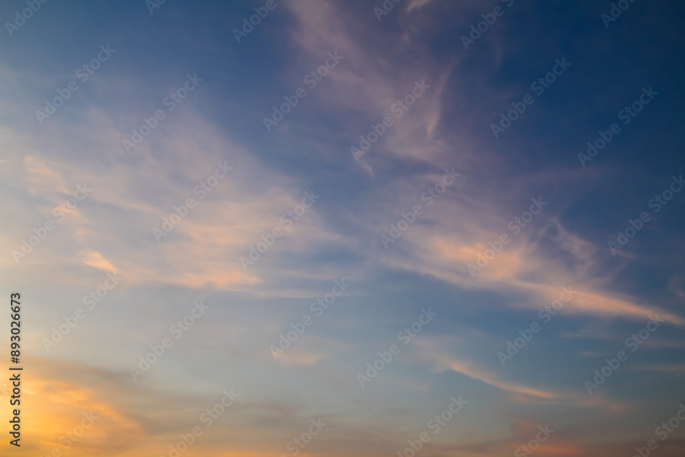 Obraz premium Clouds with warm light and blue sky in the afternoon