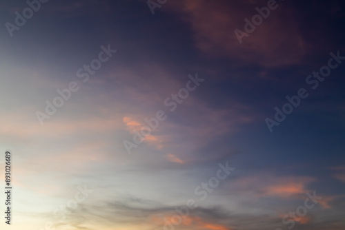 Clouds with warm light and blue sky in the afternoon