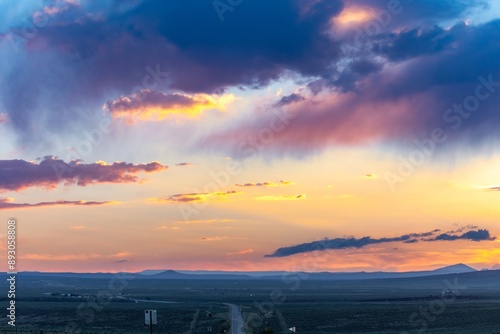 Dramatic sunset clouds over countryside in Taos, New Mexico, United States Of America.