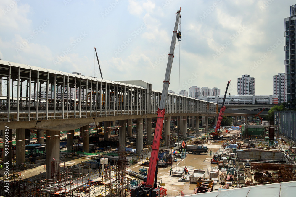 Naklejka premium Cranes On Construction Site On Summer Day