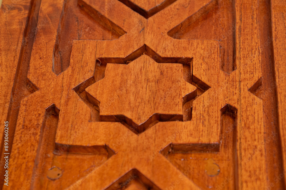 Arabic calligraphy of Allah's names in wood carvings, mosque decoration wooden doors Arabic calligraphy of Allah's names in wood carvings, mosque decoration wooden doors