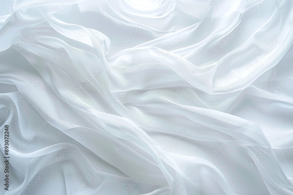 Soft white fabric drapes and flows in gentle folds, creating an ethereal and delicate texture Soft white fabric drapes and flows in gentle folds, creating an ethereal and delicate texture