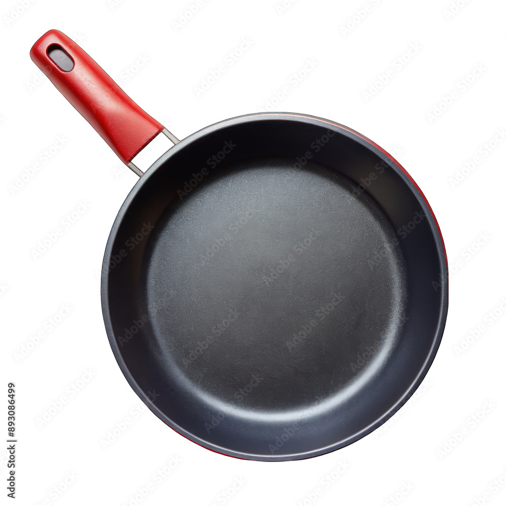 A black frying pan with a red handle top view on transparent background A black frying pan with a red handle top view on transparent background