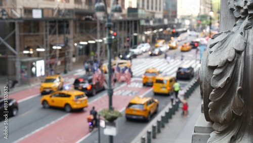 New York City Grand Central Terminal railway station, 42 street. Manhattan Midtown. Yellow taxi cab row, car transport and Pershing Square bridge, NYC, USA. American road traffic, people pedestrians.