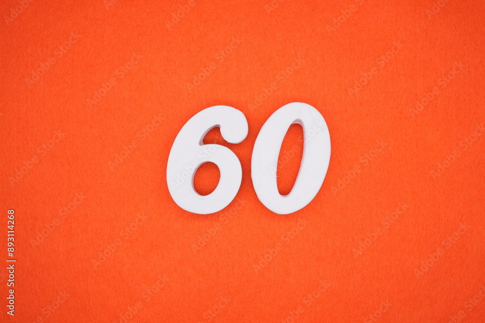 The numbers are made of white painted wood. Placed on the floor was orange paper. The numbers are made of white painted wood. Placed on the floor was orange paper.