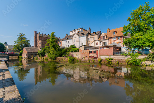 Fotografía Louviers, France 07 19 2024 : Red brick building along the Eure river in the Cen