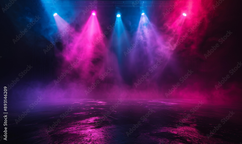 Fototapeta premium Photo of an empty stage with colorful spotlights and smoke, with pink, purple and red lights, on a black background