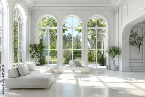 a white living room with large windows and a white sofa