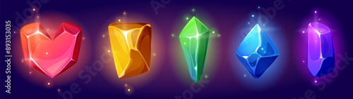 Magic gemstones set isolated on background. Vector cartoon illustration of red heart shape stone, golden rock, green emerald, blue crystal, purple amethyst, shimmering particles in air, treasure