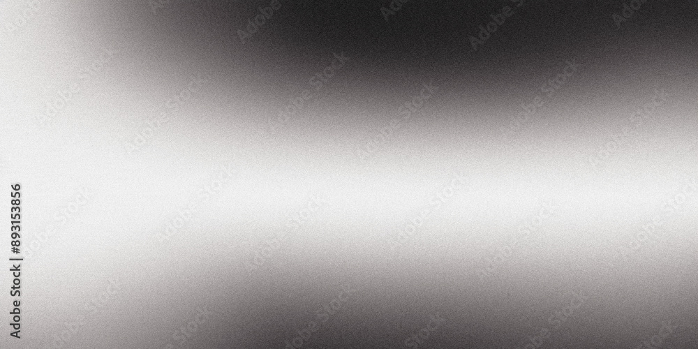 Metallic textured background with a gradient going from black to white Metallic textured background with a gradient going from black to white