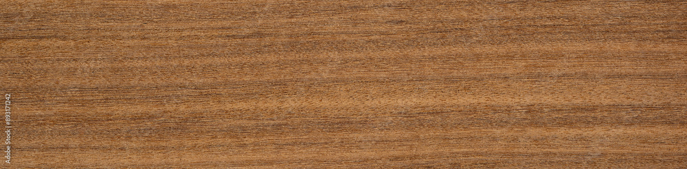 Afrormosia veneer with rich, straight grain and deep golden-brown tones