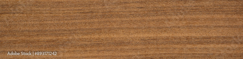 Obraz na płótnie Afrormosia veneer with rich, straight grain and deep golden-brown tones w salonie
