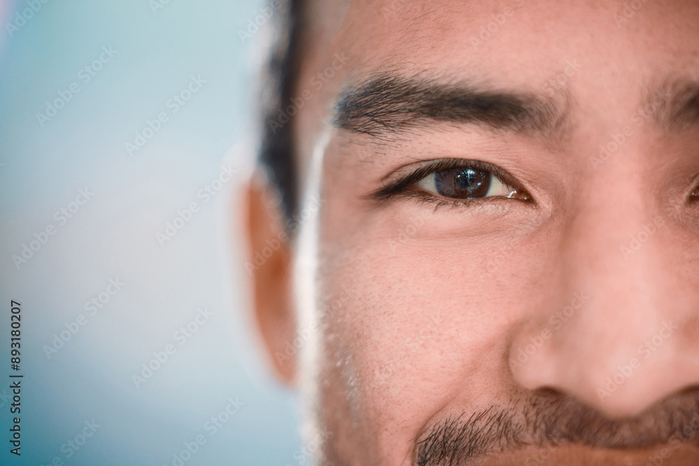 Obraz premium Vision, business and half portrait of man with mockup, confidence and professional with pride. Happy, eye and face of businessman with opportunity, growth and career development on blue background