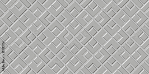 A gray and white patterned background with squares and triangles