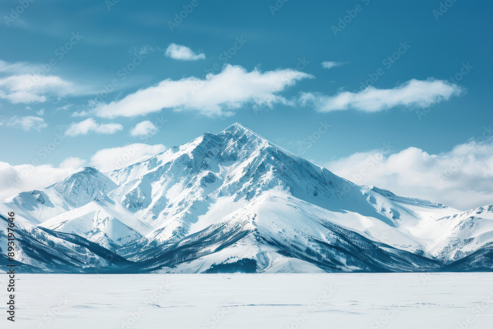 Majestic snow-covered mountain peak under a clear blue sky, with a vast blanket of snow extending across the serene landscape. Majestic snow-covered mountain peak under a clear blue sky, with a vast blanket of snow extending across the serene landscape.
