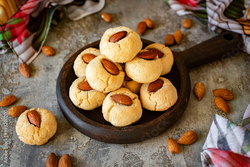 Принти на полотні Sweet nut cookies for dessert on a gray background