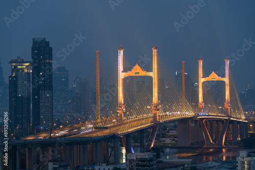 Aerial view of Rama 9 bridge and Colored lights are turned on the parallel bridge to Rama 9 Bridge across the Chao Phraya River