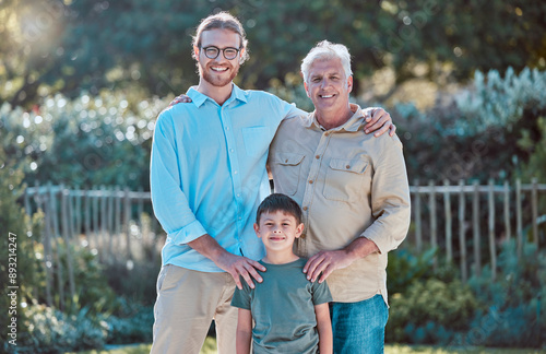 Family, man and child with grandfather in portrait, nature and outside for bonding with love or generations together. Park, home lawn and people smiling with happiness, relationship and weekend break