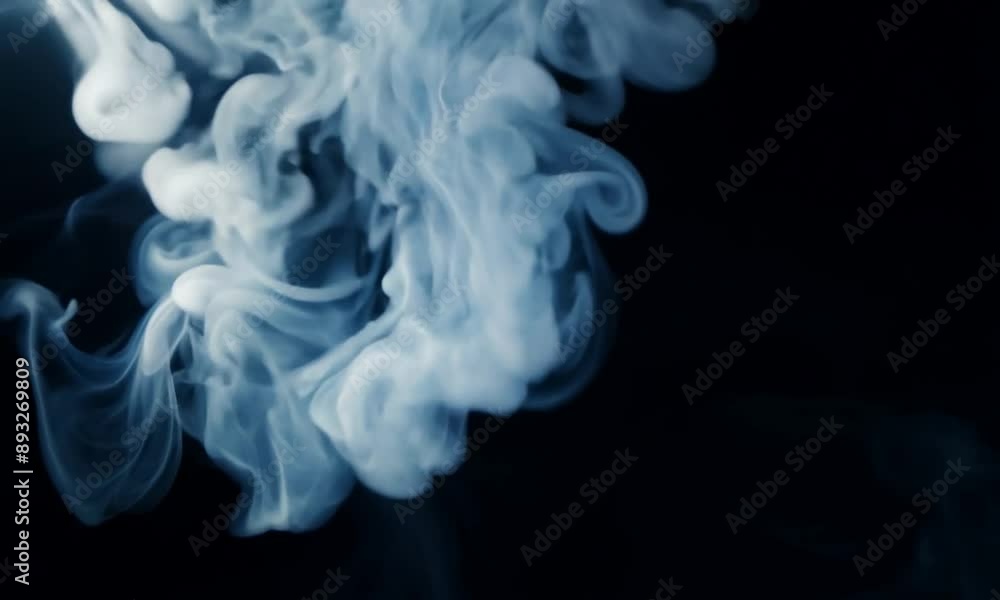 Rotation of the smoke veils under the lights on a black background. 4K video. Rotation of the smoke veils under the lights on a black background. 4K video.