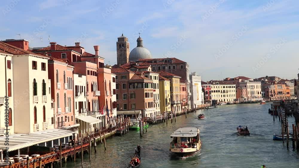 Venice, Italy - February 11, 2023: View of Grand Canal with gondolas and boats in Venice, Italy Venice, Italy - February 11, 2023: View of Grand Canal with gondolas and boats in Venice, Italy