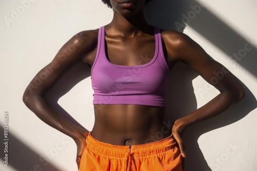 Close up of a woman on a white background a close-up of the waist and stomach area. photo