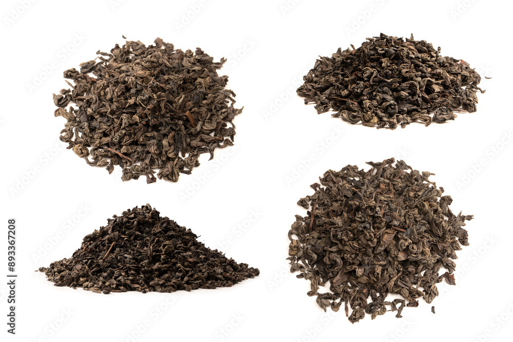Dried tea leaves isolated on a white background. Dried tea leaves isolated on a white background.