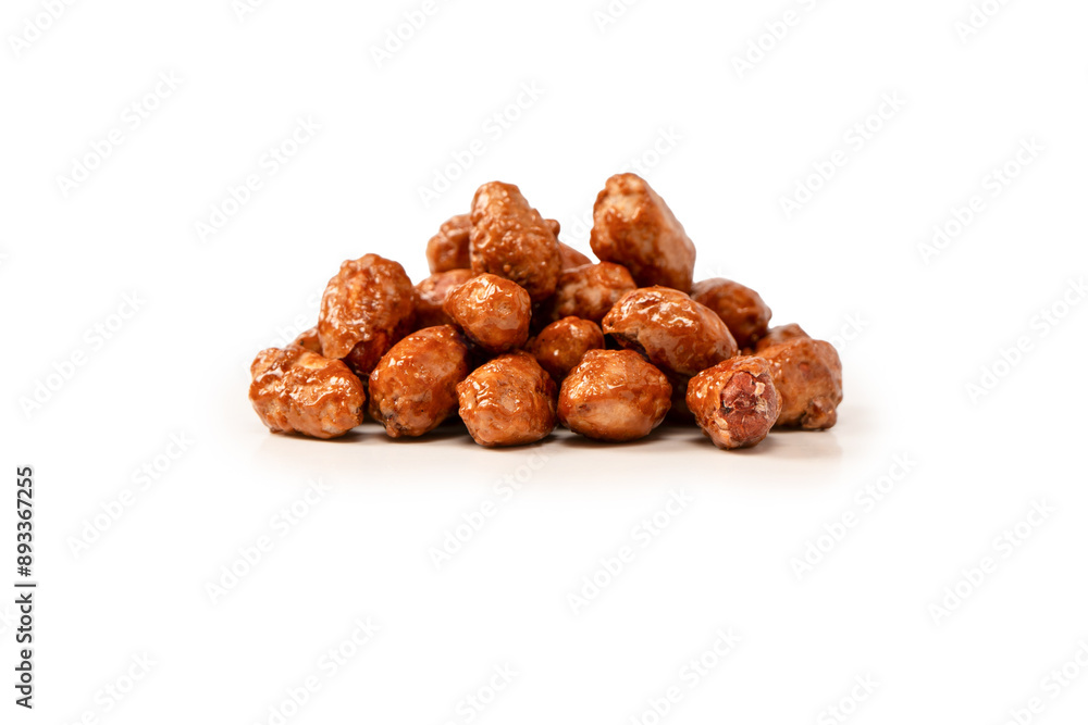 Tasty sweet roasted peanuts isolated on a white background. Tasty sweet roasted peanuts isolated on a white background.