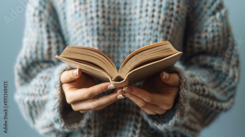 The hands holding book photo