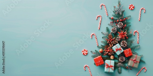 Christmas Gifts and Candy Canes on Blue Background