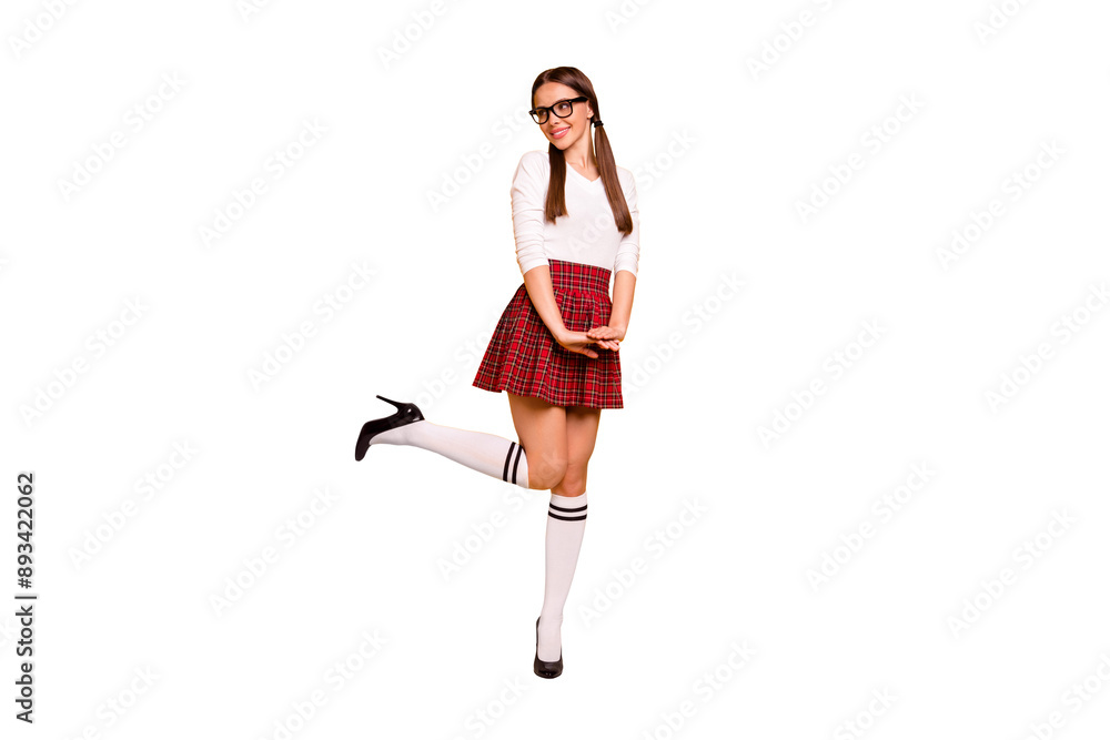 Full length body size view of her she nice attractive winsome lovely lovable cheerful cheery positive girl wearing uniform having fun isolated over bright vivid shine yellow background Full length body size view of her she nice attractive winsome lovely lovable cheerful cheery positive girl wearing uniform having fun isolated over bright vivid shine yellow background
